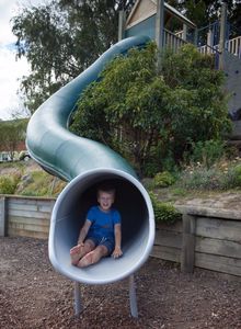 A fun ride down, the new Playgear™ Fibreglass, Tunnel Slide at a local Dunedin School.